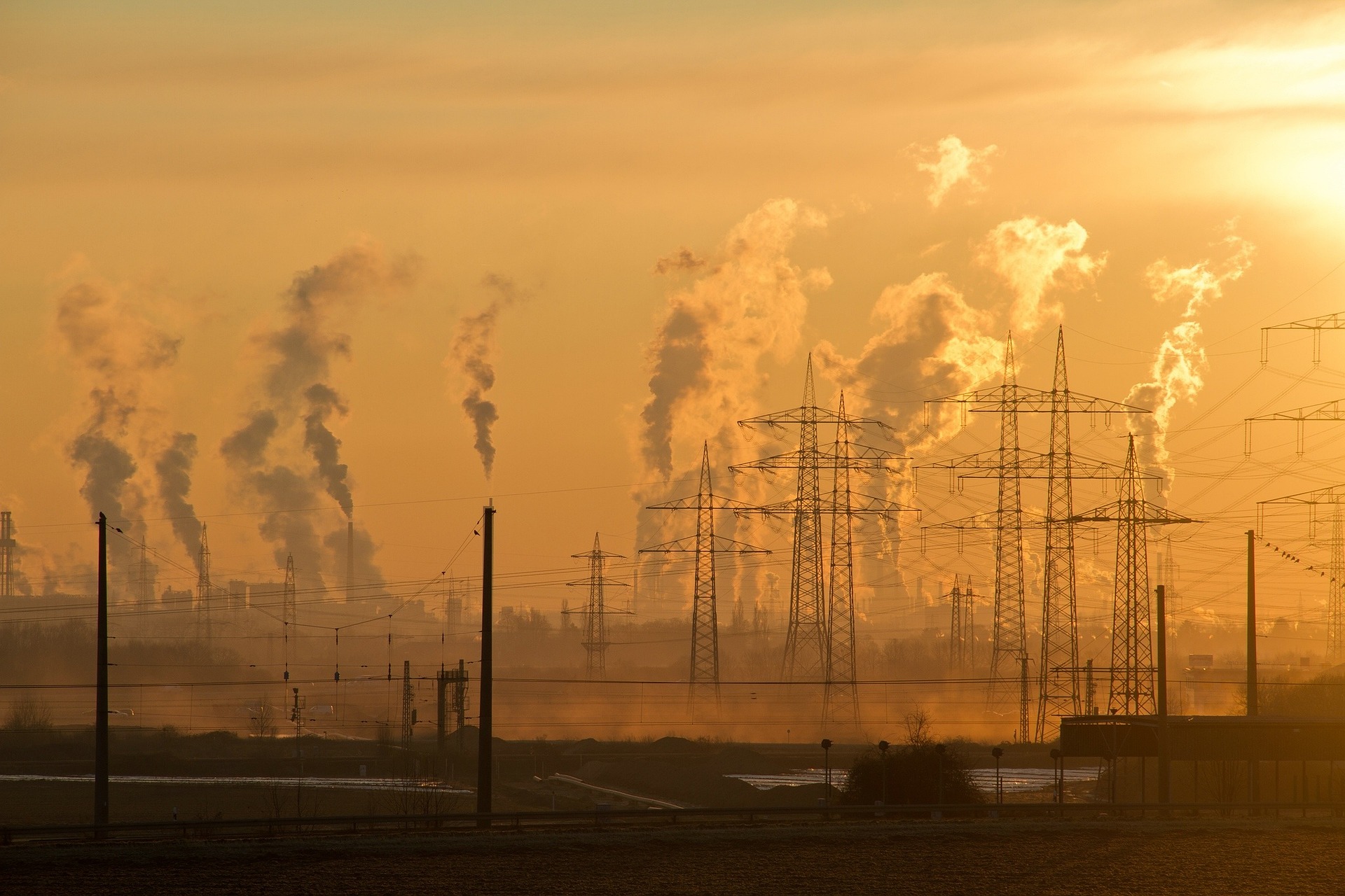 Smog and smoke from industry colored by a sunrise.